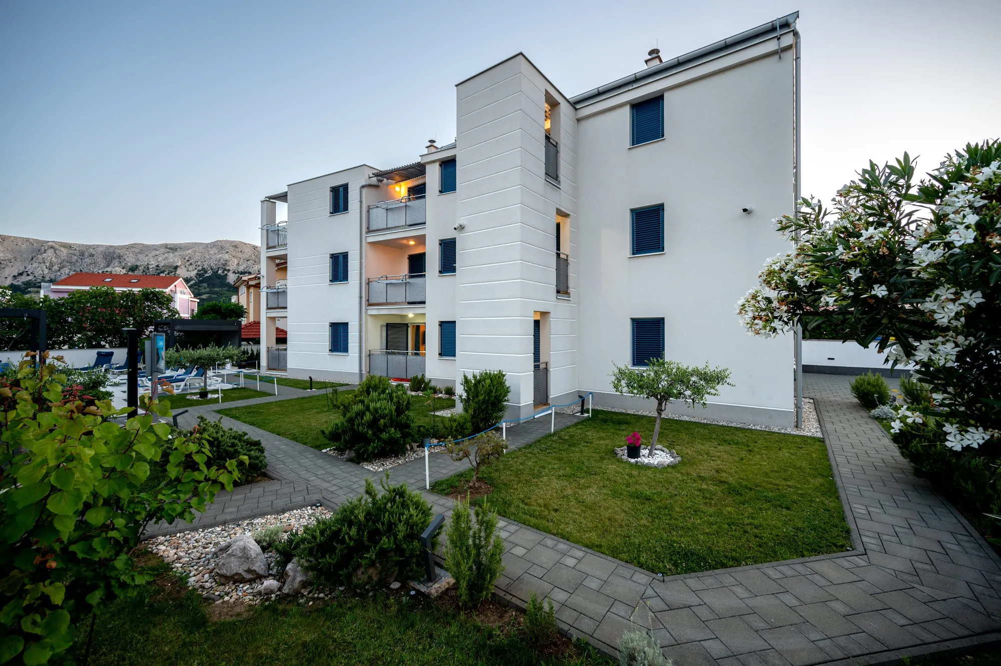 Adorami Apartments building and garden, Baška